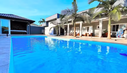 Casa Alto padrão com 5 dormitórios à venda, 320 m² por R$ 2.200.000 - Coroados - Guaratuba/PR