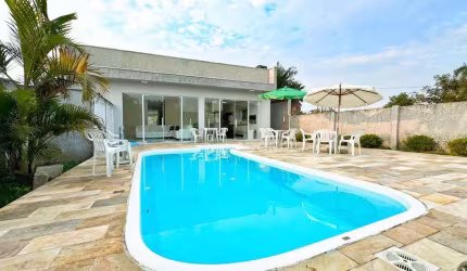 Casa com Piscina, Amplo Terreno, 4 dormitórios à venda, 161 m² por R$ 1.150.000 - Eliana - Guaratuba/PR