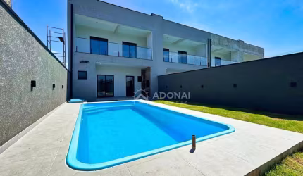 Sobrado com 4 dormitórios à venda, 171 m² por R$ 1.250.000,00 - Brejatuba - Guaratuba/PR