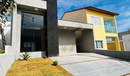 Casa térrea 03 dormitórios, pé direto alto, área gourmet integrada..