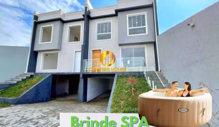 Sobrado quadriplex com garagem no subsolo 3 quartos sendo 1 suíte em condomínio fechadobno Xaxim