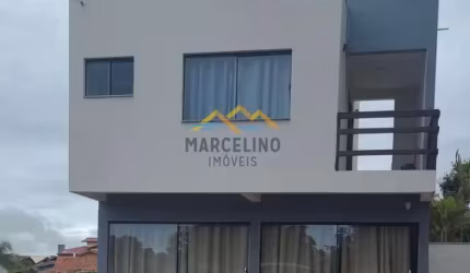 Casa no centrino da praia do Rosa
