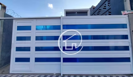 Casa com 2 dormitórios à venda por R$ 375.000,00 - Caiçara - Praia Grande/SP