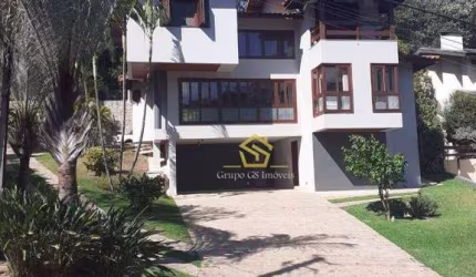 Casa com 4 dormitórios à venda, 320 m² por R$ 1.670.000,00 - Condomínio Chácara Flora - Valinhos/SP