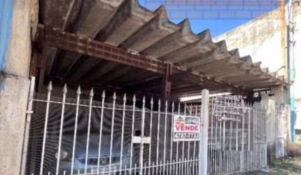 Imperdível oportunidade: Casa à venda em Taboão da Serra-SP, Jardim Wanda, 3 quartos, 2 salas, 2 banheiros, 2 vagas de garagem.