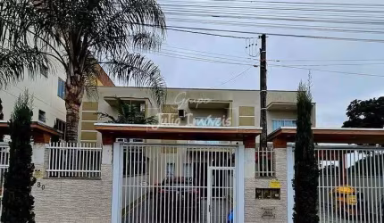 Sobrado com passagem lateral área de festa Brusque