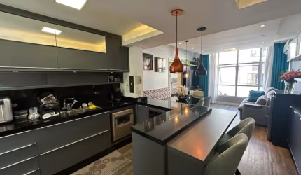 Apartamento com 2 suítes no Centro