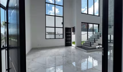 Casa de condomínio para venda tem 388 metros quadrados com 4 quartos