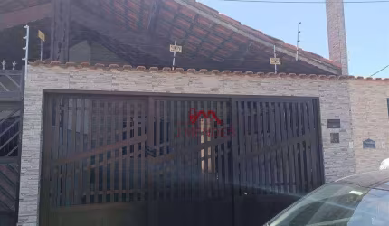 Casa com 3 dormitórios à venda, 111 m² por R$ 620.000,00 - Vila Guilhermina - Praia Grande/SP