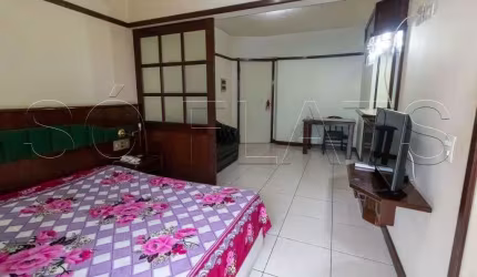 Flat no Centro a venda totalmente mobiliado e com serviços.