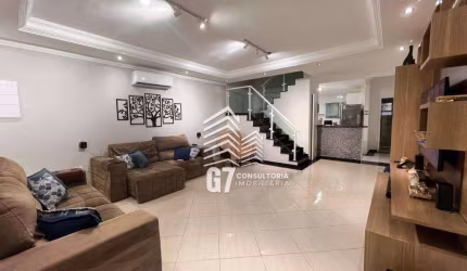 Sobrado com 3 dormitórios à venda, 121 m² por R$ 595.000,00 - Maracanã - Praia Grande/SP
