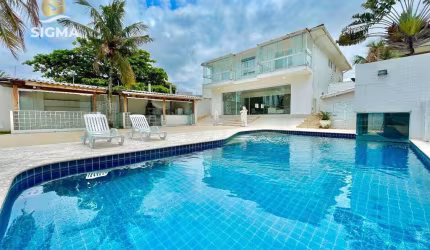 Casa com lazer de frente para o mar - Praia da Enseada, Guarujá.