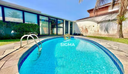 Casa com 4 dormitórios à venda, 240 m² por R$ 1.680.000,00 - Jardim Acapulco - Guarujá/SP