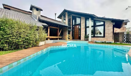 Casa com 4 Suítes à venda no Condomínio Jardim Acapulco - Guarujá/SP.