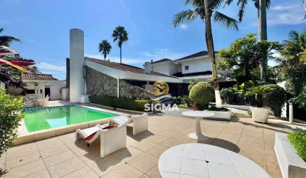Casa com 6 sendo 4 suítes à venda, 299 m² por R$ 1.500.000 - Balneário Praia do Perequê - Guarujá/SP.