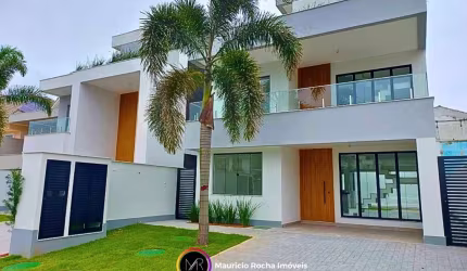Casa contemporânea com piscina e área gourmer no Recreio dos Bandeirantes: 5 quartos, 5 suítes, 2 salas e 350m² de área privativa. Venha conferir!