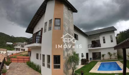 Casa com 4 dormitórios, 550 m² - venda por R$ 2.000.000,00 ou aluguel por R$ 9.450,00/mês - Clube da Montanha - Atibaia/SP