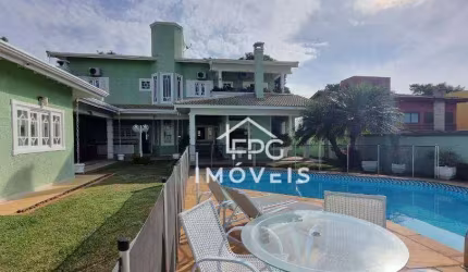Casa com 4 dormitórios à venda, 465 m² por R$ 2.430.000,00 - Condomínio Shambala I - Atibaia/SP