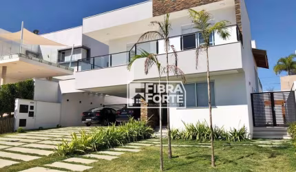 Casa para venda em condominio fechado na Região do Alphaville com 4 suítes.