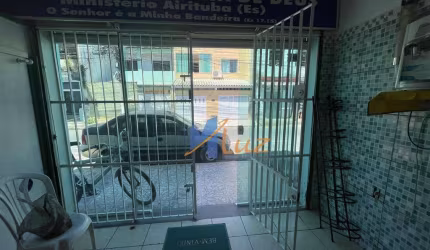 Vende-se Prédio com 2 Apartamentos e Espaço Comercial na Vila Badejo – Oportunidade Única!