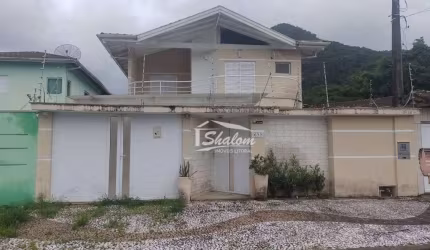 Casa com 4 dormitórios à venda, 296 m² por R$ 1.200.000,00 - Cidade Jardim - Caraguatatuba/SP