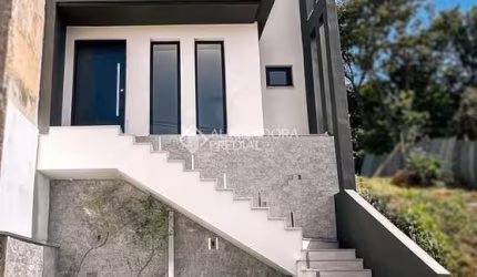 Casa em condomínio fechado com 3 quartos à venda na Rua Tancredo Neves, 990, Jansen, Gravataí, 150 m2 por R$ 799.000
