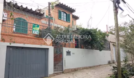 Casa em condomínio fechado com 3 quartos à venda na Rua Cuiabá, 308, Medianeira, Porto Alegre, 140 m2 por R$ 395.000