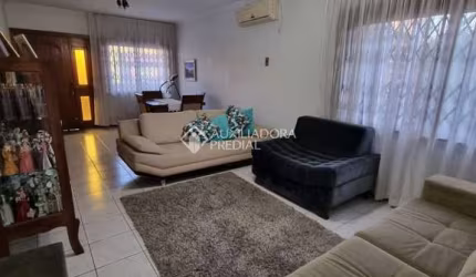 Casa com 3 quartos à venda na Rua Albion, 1054, Passo do Feijó, Alvorada, 148 m2 por R$ 589.990