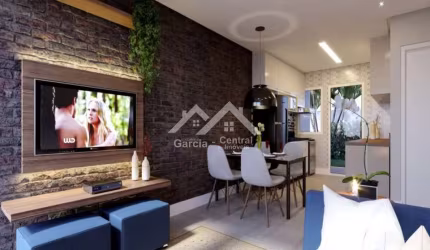 Apartamento térreo, prédio frente mar, com 2 dormitórios (1 suíte)