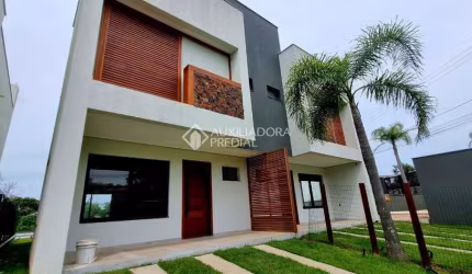 Casa com 3 quartos à venda na Roberto Teixeira De Souza, 7, Ibiraquera, Imbituba, 129 m2 por R$ 1.419.236