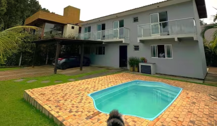 Casa em condomínio fechado com 5 quartos à venda na Vereador Laudelino Antônio Teixeira, 1668, Zona Rural, Garopaba, 107 m2 por R$ 1.380.000