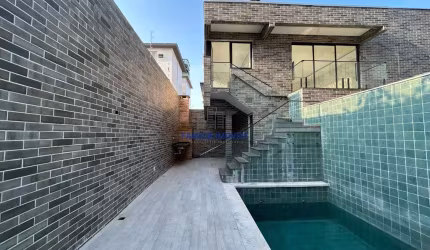 Casa em condomínio fechado com 3 quartos à venda na Delphin Moreira, --, Embaré, Santos por R$ 1.800.000