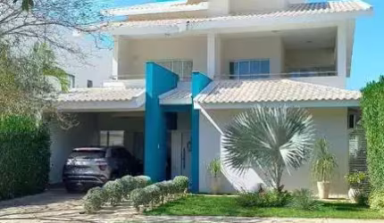 Casa com 4 dormitórios à venda, 319m² por R$ 1.900.000