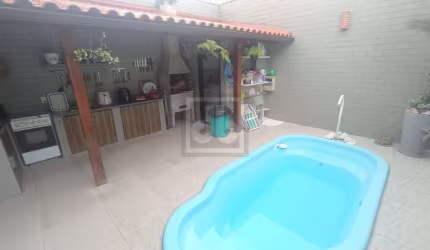 Casa em condomínio fechado com 5 quartos à venda na Rua Jorge Veiga, Portuguesa, Rio de Janeiro, 162 m2 por R$ 1.200.000