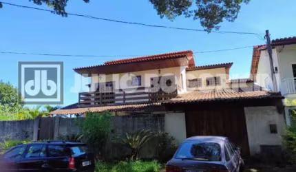 Casa em condomínio fechado com 5 quartos à venda na Rua Aldo Rebello, Pechincha, Rio de Janeiro, 503 m2 por R$ 1.100.000