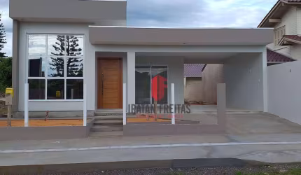 Casa com 3 dormitórios à venda, 132 m² por R$ 675.000,00 - Paraíso - Torres/RS