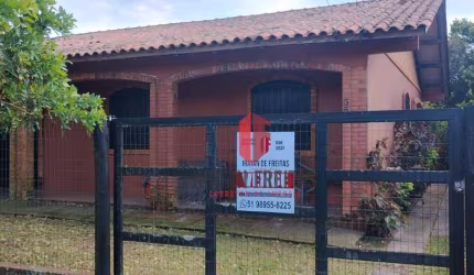 Casa com 4 dormitórios à venda, 144 m² por R$ 398.000,00 - Balneário Atlântico - Arroio do Sal/RS