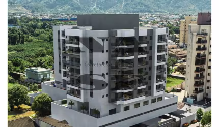 Apartamento com duas suítes à venda, Jardim Aruan, praia do Indaia, Caraguatatuba, SP