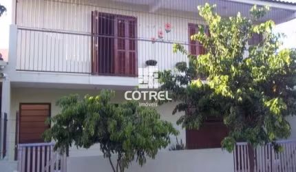 Casa com 2 dormitórios á venda no Bairro Urlândia na cidade de Santa Maria -RS