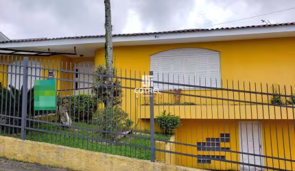Casa 6 dormitórios e 3 vagas de garagem no Bairro Nossa Senhora das Dores locali