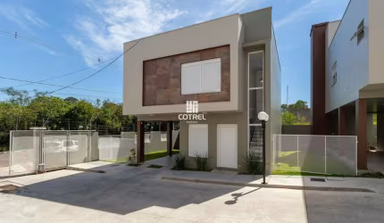 Casa 3 dormitórios sendo 3 suítes e 2 vagas de garagem no Bairro Diácono João Lu