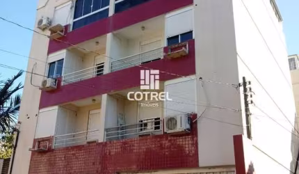 Apartamento central 2 dormitórios sendo 1 suíte e 1 vaga de garagem localizado n