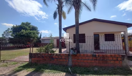 Casa 3 dormitórios 1 vaga de garagem localizada no Bairro Juscelino Kubitscheck