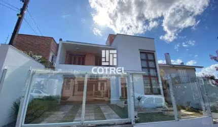 Casa com 3 dormitórios 1 suíte 2 vaga de garagem localizada no bairro Camobi na