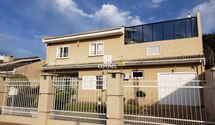 Casa 3 dormitórios sendo 2 suítes e 2 vagas de garagem no Bairro Camobi localiza