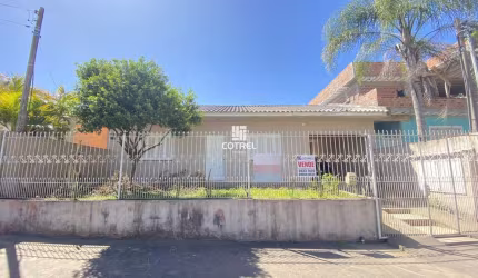 Casa 2 dormitórios com 2 vagas de garagem no Bairro Pinheiro Machado localizada