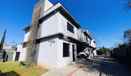 Casa semimobiliada em condomínio fechado com 2 dormitórios e 2 vagas no Bairro T