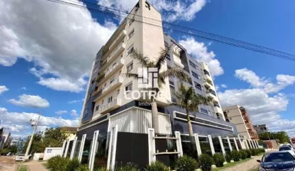 Apartamento  2 dormitórios, suíte e 2 vagas de garagem localizado no Bairro Camo