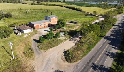 Terreno comercial com casa e pavilhão na BR-392 em Santa Maria/RS