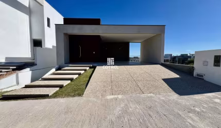 Casa para venda, 3 suítes, 2 vagas de garagem, situada no condomínio fechado Rea